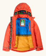 An open Frugi kids 3 in 1 rambler coat in fire upon a star showing the full length zip, fleece inner lining on the hood and a zipped pocket on the inner chest