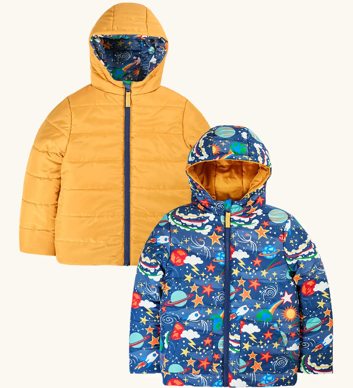 Frugi reversible toasty trail jacket in explore the stars. A repeating outer space design and a yellow colour on the reverse side. Features a full length zip