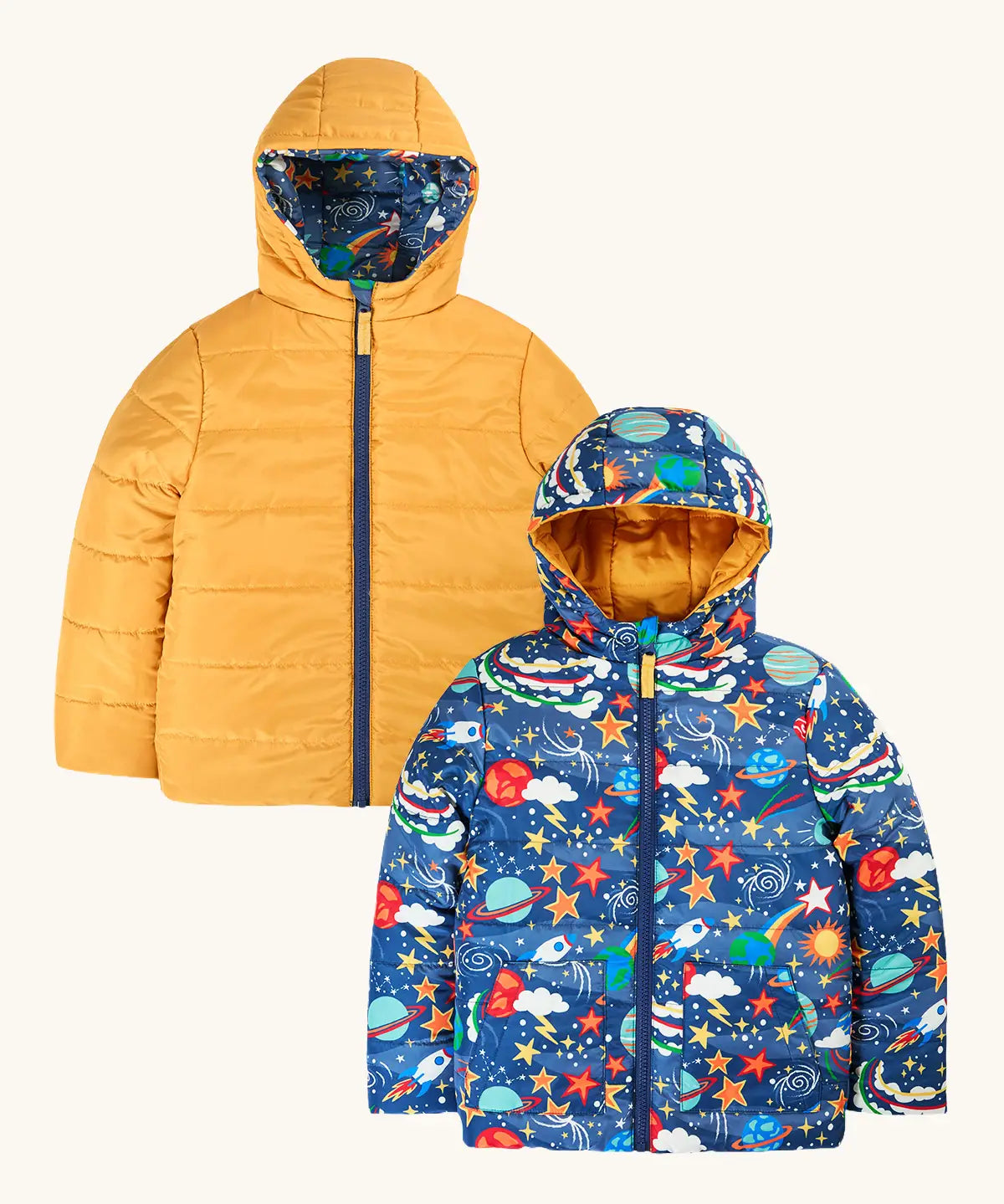Frugi reversible toasty trail jacket in explore the stars. A repeating outer space design and a yellow colour on the reverse side. Features a full length zip