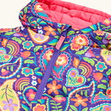 Frugi reversible toasty trail hooded jacket in pretty paisley showing the purple zip detail