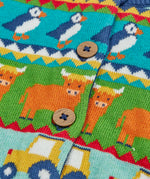Frugi GOTS 100% organic cotton kids cardigan showing a close up of the highland  fairisle theme design and wooden buttons on the front