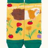 Frugi GOTS 100% organic cotton yellow sock with guinea pigs from the the animal pack finished with a comfy green ribbed cuff 