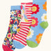 Frugi GOTS 100% organic cotton 3 pack socks in horses, sparkles, and flowers themes. Each pair is finished with comfy ribbed cuffs and a stretchy fit