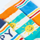 Frugi rock my socks 3 pack in Summer inspired colours and designs laid flat showing elasticated ankle cuff