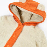 Frugi rye hooded cream fleece jacket with orange cord hood with fluffy ears and orange cord piping.
