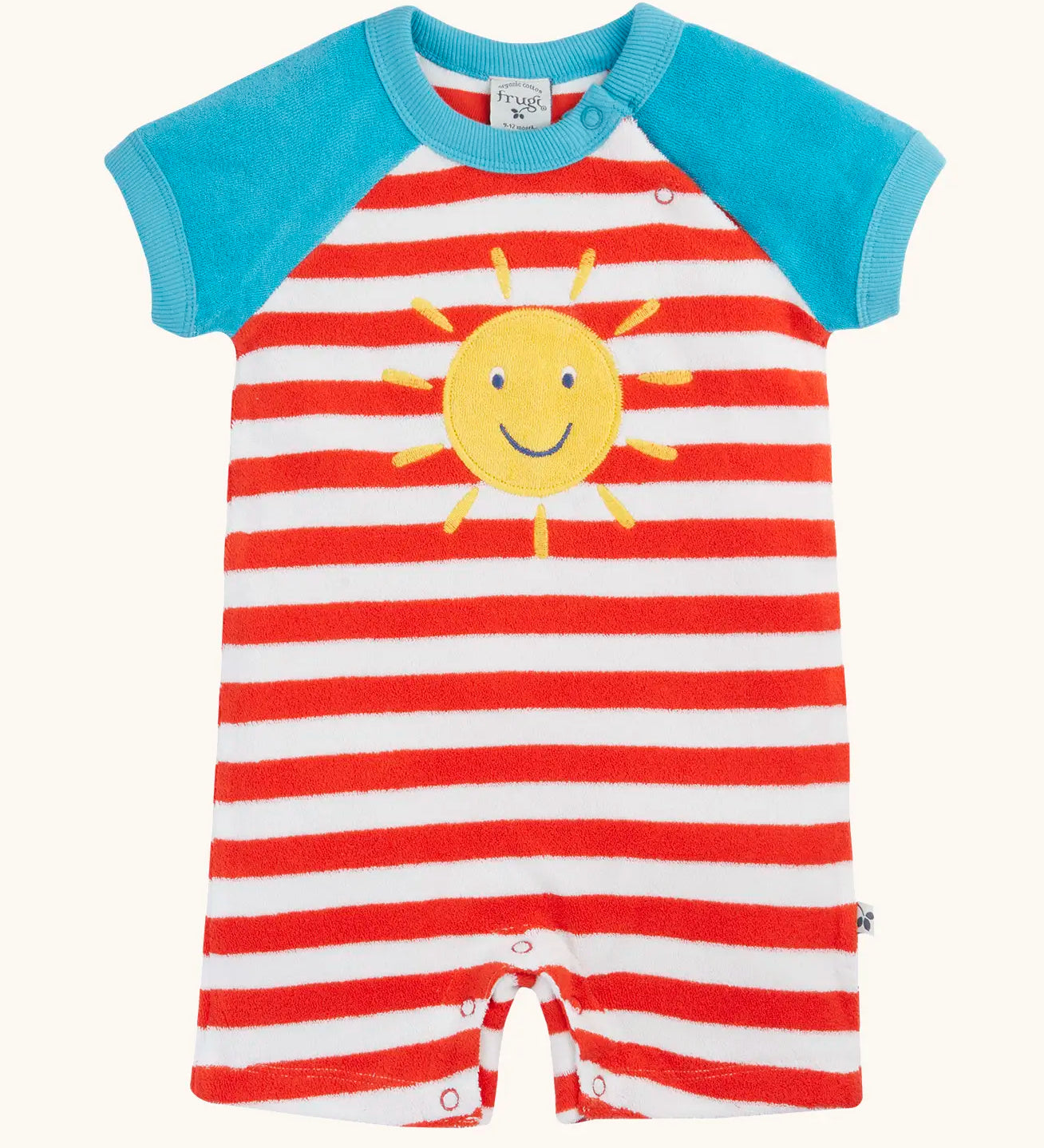 Frugi baby towelling romper with blue sleeves, white and red stripe body, yellow sun on the front and popper fasteners