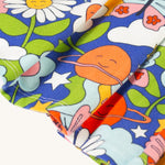 A closer look at the dress skirt and retro happy print on the Frugi Sofia Skater Dress - Retro Happy