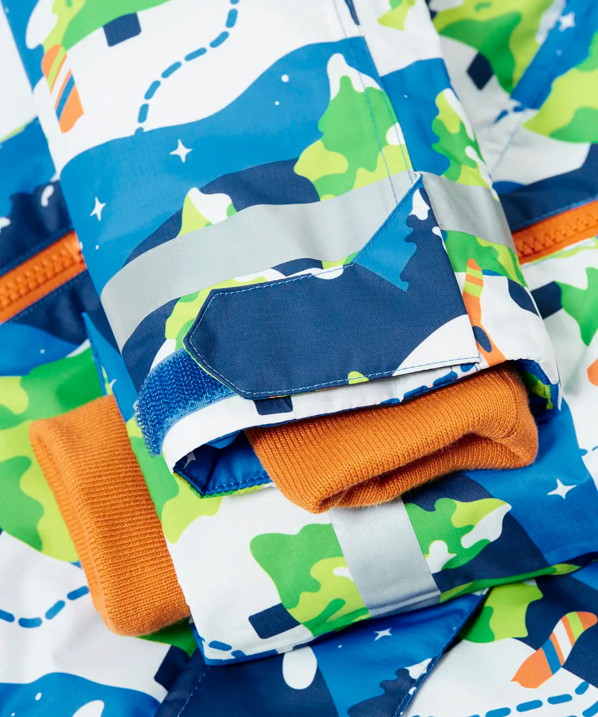  Frugi recycled polyester snow and ski coat in starry slopes showing the adjustable velcro strap on the cuff
