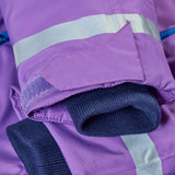 Frugi kids hooded snow and ski coat in fig purple showing close up of the velcro strap on the cuff and reflective strip