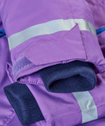 Frugi kids hooded snow and ski coat in fig purple showing close up of the velcro strap on the cuff and reflective strip