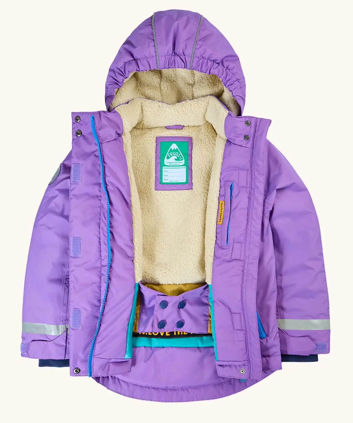 Opened Frugi kids snow and ski coat in purple showing a warm thick navy fleece inner with a name patch stitched inside. Features a full length zip with velcro fasteners. 