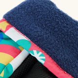Frugi kids fun frenzy snow mittens. Showing close up of navy fleece inner
