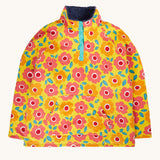 Frugi organic cotton fleece laid flat. In yellow with a navy fleece inner and a repeating floral print