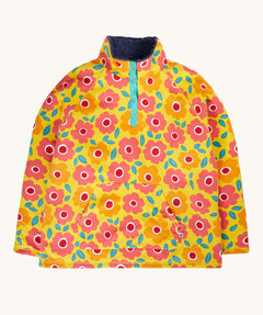 Frugi organic cotton fleece laid flat. In yellow with a navy fleece inner and a repeating floral print