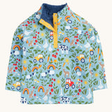 Frugi organic cotton fleece laid flat. In light blue with a repeating farm themes print. Features a dark blue fleece inner and popper fasteners 
