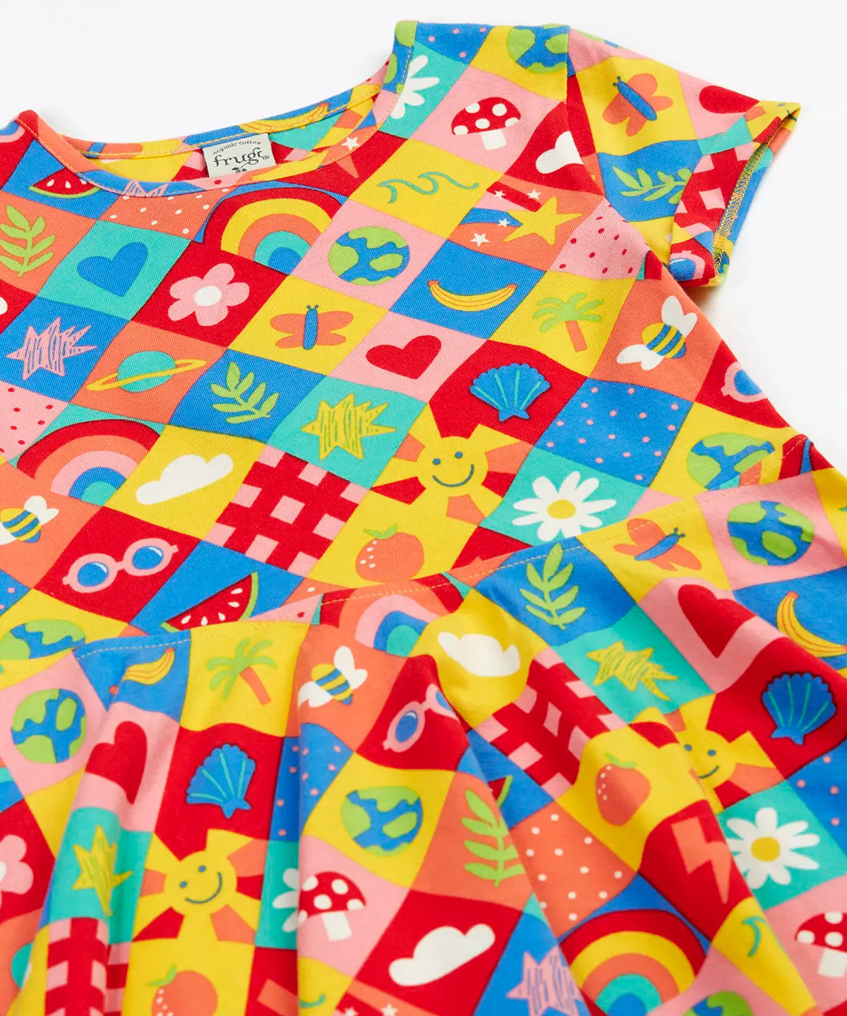 Frugi favourite things Spring skater dress laid flat showing the colourful repeating design