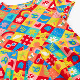 Frugi favourite things Spring skater dress laid flat showing the colourful repeating design