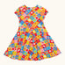 Frugi favourite things Spring skater dress. GOTS organic cotton short sleeved dress with a colourful repeating  Spring design