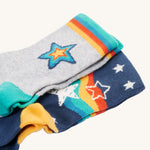 A closer look at the star prints on the Frugi Rock My Socks - Stars 2 Pack