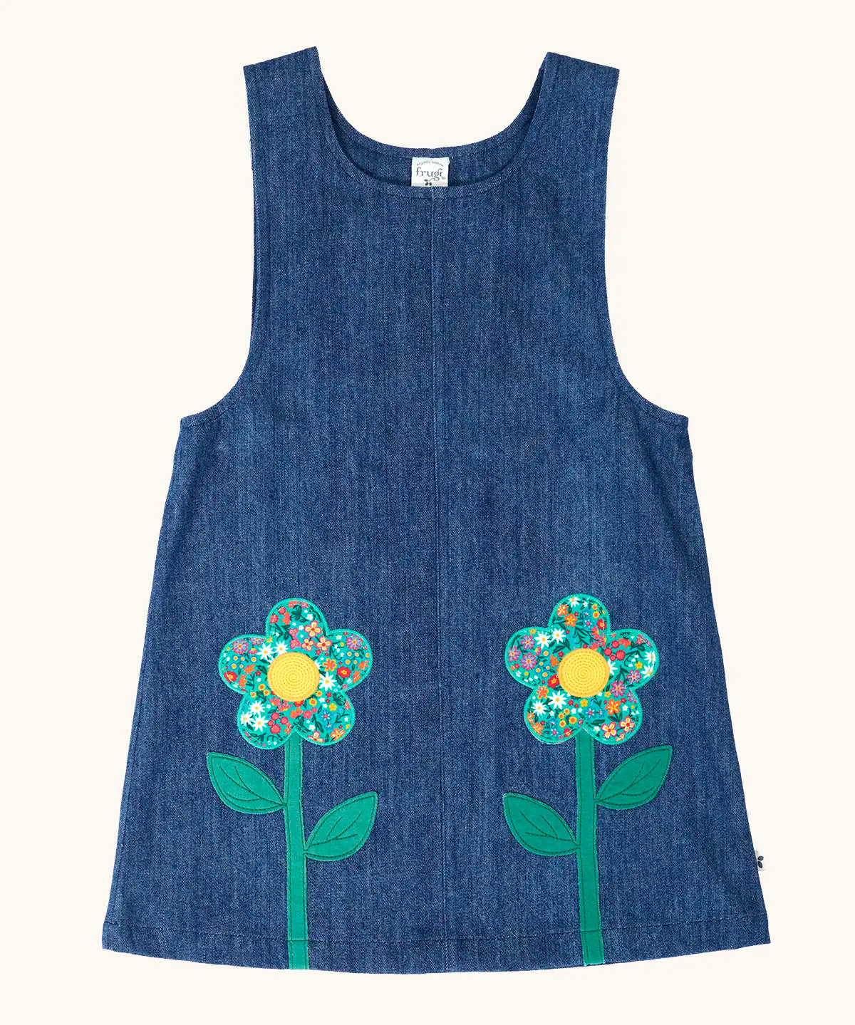 Frugi GOTS organic cotton mid wash denim kids pinafore dress with 2 flower appliques on the gather