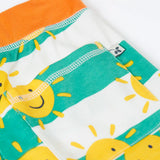 Frugi green and white striped shorts with repeating sunshine design laid flat showing back pocket