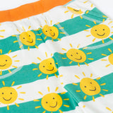 Frugi green and white striped shorts with repeating sunshine design laid flat showing side pockets and orange waist band
