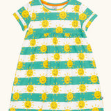 Frugi tallie dress. A GOTS organic cotton short sleeved dress in green and white stripes with a repeating smiling sun design