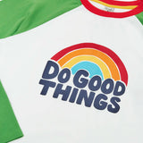 Frugi GOTS 100% organic cotton long sleeve top in white with green sleeves and a do good things rainbow slogan graphic on the chest