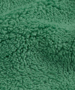A close up of the ted fleece detail on the holly green Frugi pull ups available at Babipur. 