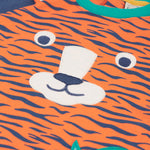A closer look at the tiger face applique on the Frugi Happy Raglan Top - Tiger