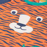 A closer look at the tiger face applique on the Frugi Happy Raglan Top - Tiger