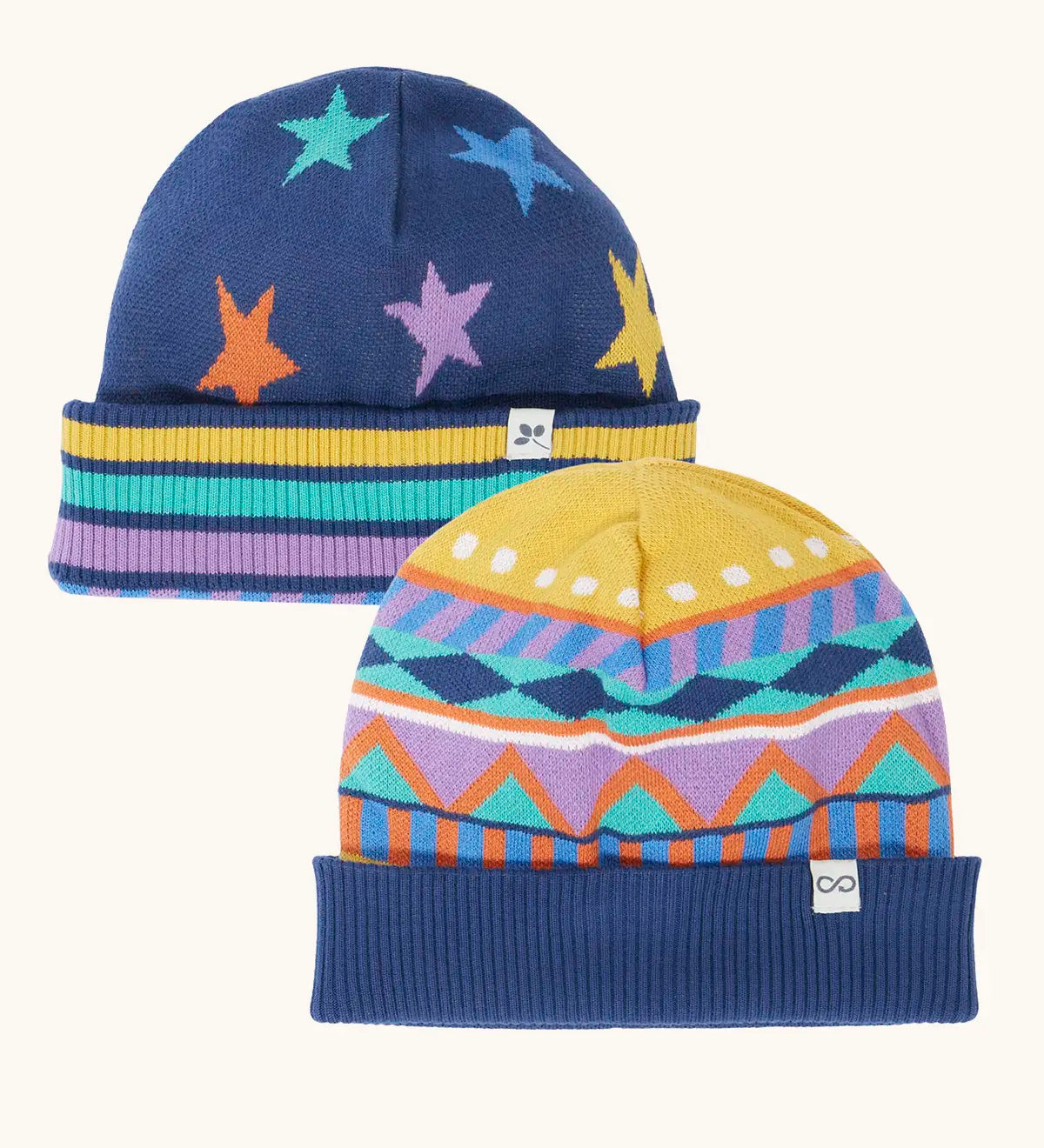 Frugi GOTS organic cotton voyager reversible hat. A navy hat with a winter fairisle and star design with striped brim. 