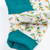 Frugi GOTS 100% organic cotton onesie in white with repeating koala prints showing close up of the teal leg cuffs