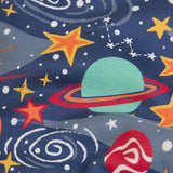 Frugi kids onesie laid flat showing a repeating outer space print on navy organic cotton fabric