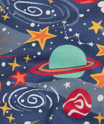 Frugi kids onesie laid flat showing a repeating outer space print on navy organic cotton fabric
