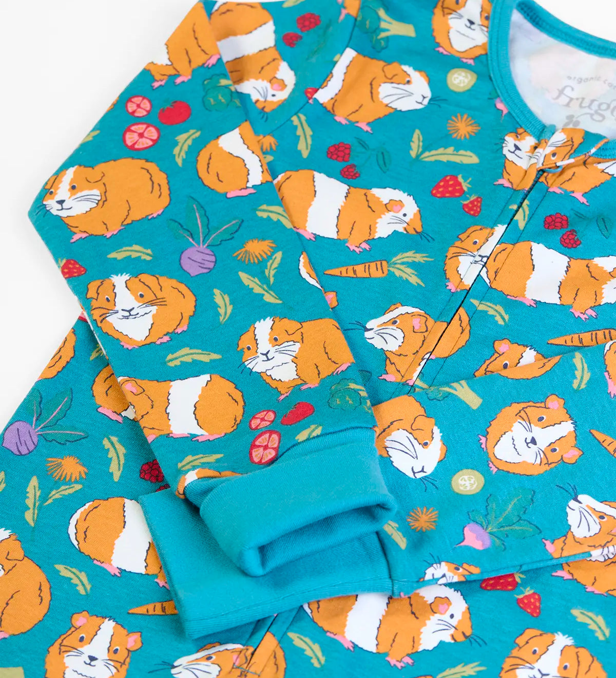 Frugi GOTS 100% organic cotton all in on in blue with a repeating guinea pig print showing the full front zip and fold up cuffs for extender wear