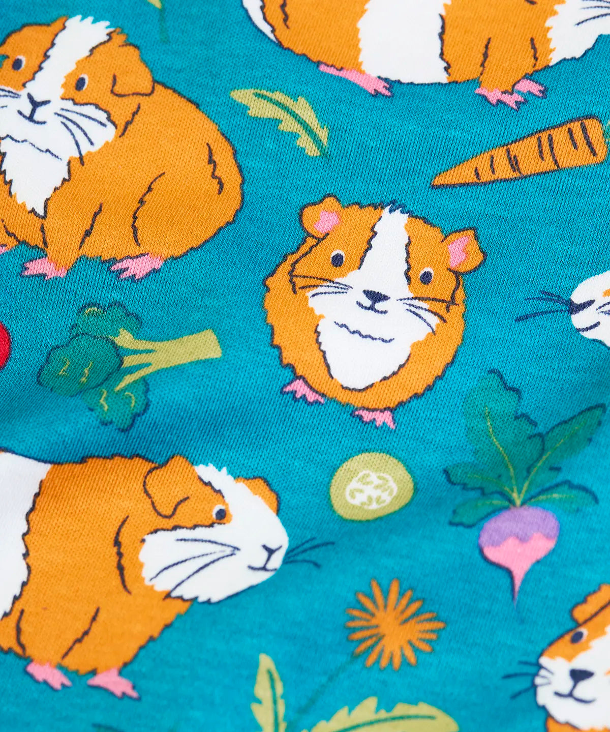 Frugi GOTS 100% organic cotton all in on in blue showing a close up of the repeating guinea pig with vegetables print 