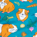 Frugi GOTS 100% organic cotton all in on in blue showing a close up of the repeating guinea pig with vegetables print 