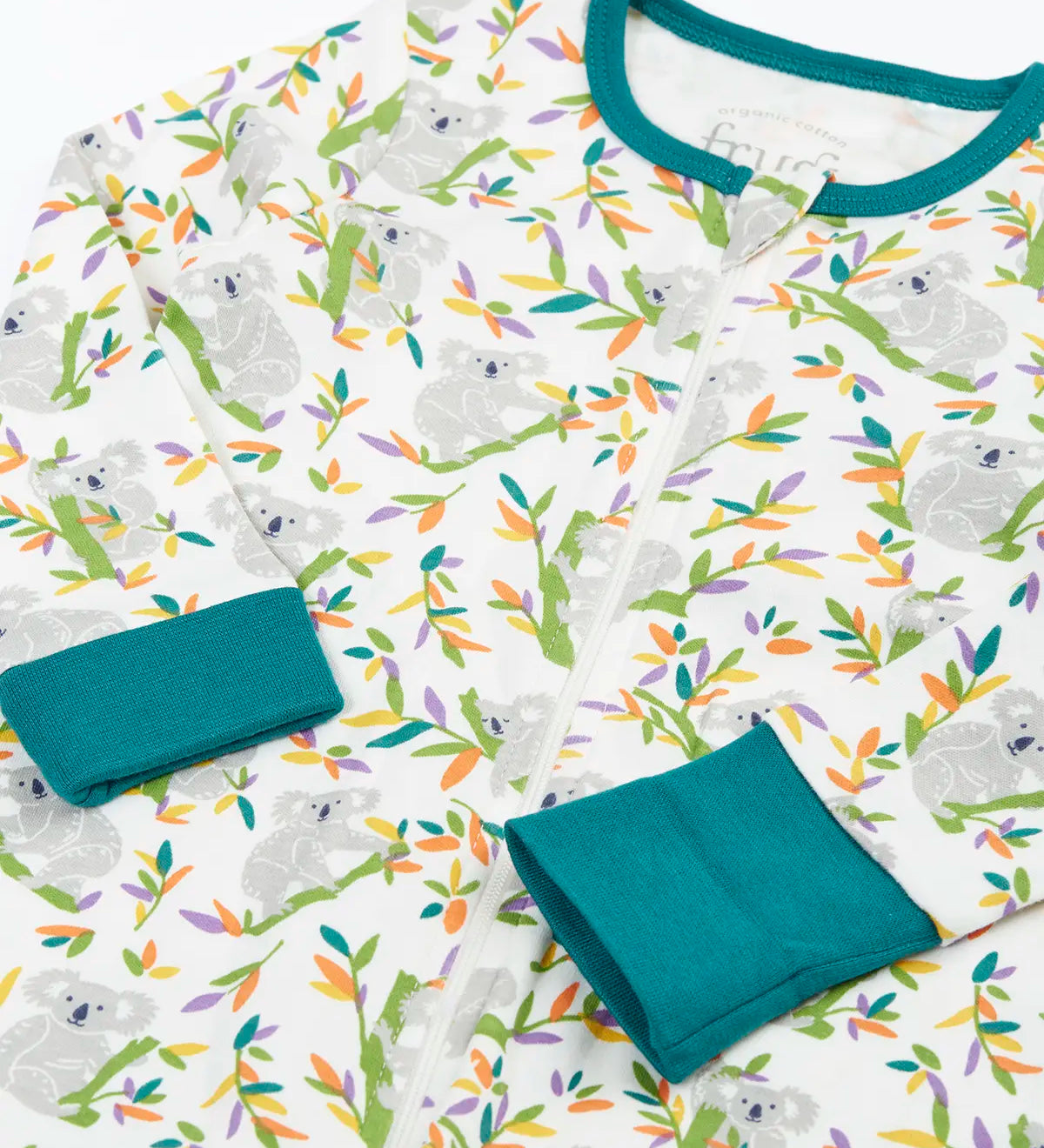 Frugi GOTS 100% organic cotton onesie in white with repeating koala printslaid flat showing the teal cuffs and neck trim dressing