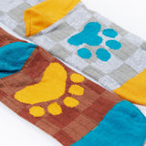 A close up of the Frugi kids beary wild character socks 2 pack showing the paw detail on the sole of each sock. 