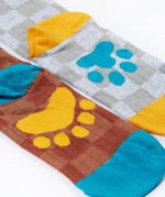 A close up of the Frugi kids beary wild character socks 2 pack showing the paw detail on the sole of each sock. 