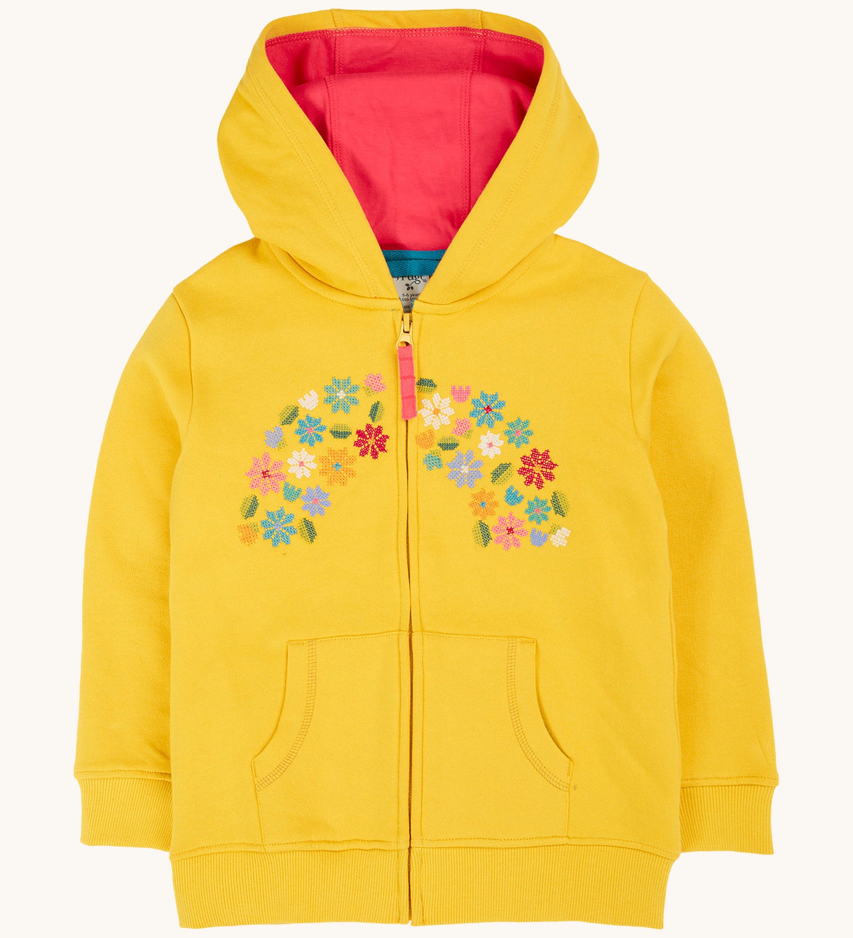 Frugi kids carbis hoodie in bumblebee/flowers available at Babipur. A GOTS organic cotton jersey style hoodie in bright yellow with delicate flower embroidery in a shape of a rainbow. Features elasticated cuffs and a full length zip.