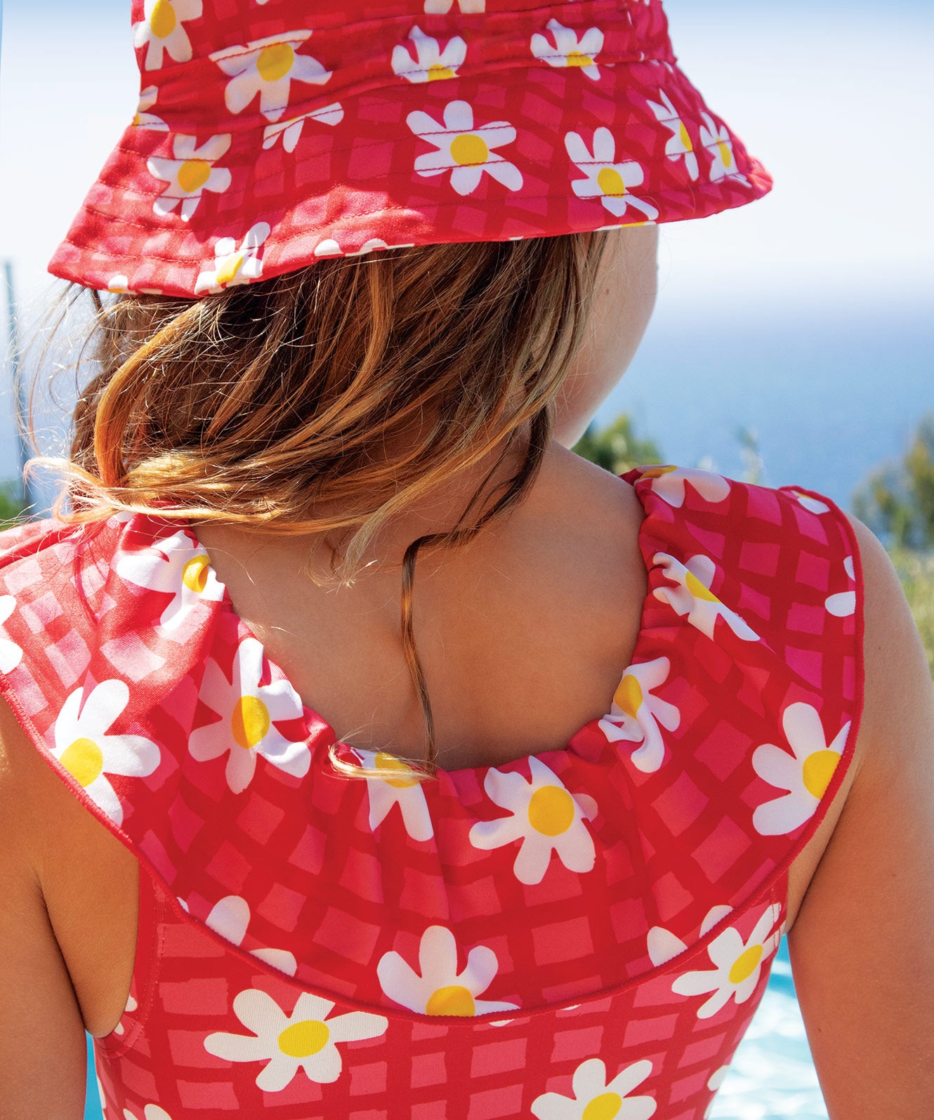 Frugi coral little swimsuit daisy chain design