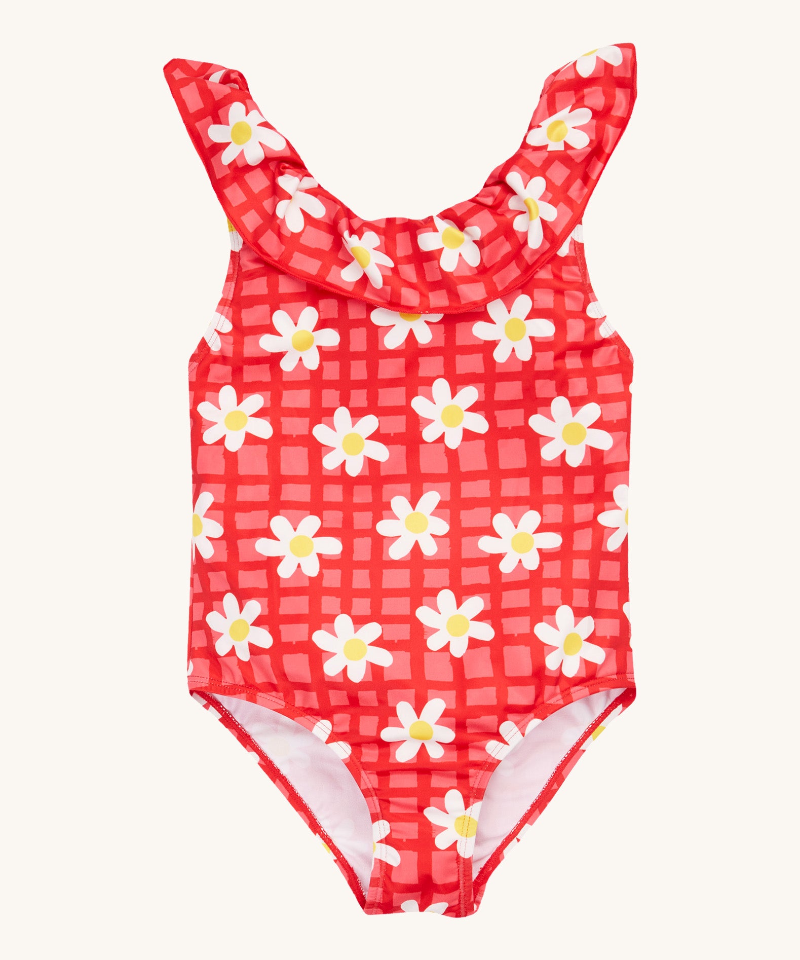 Frugi coral little swimsuit daisy chain design on a cream background.