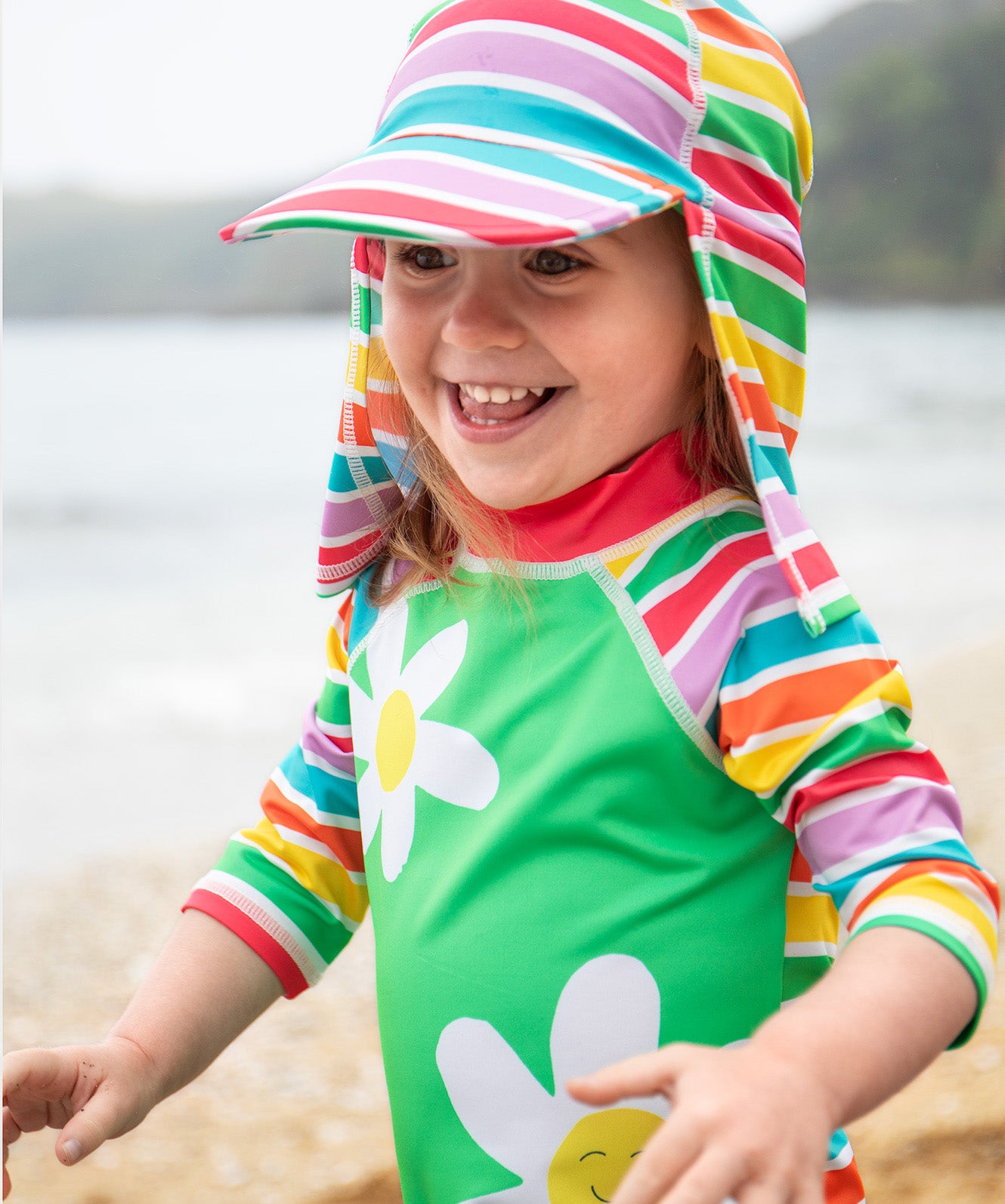 Frugi green and stripe sun safe suit and hat daisy design