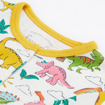 Frugi white baby grow dino land neck detail