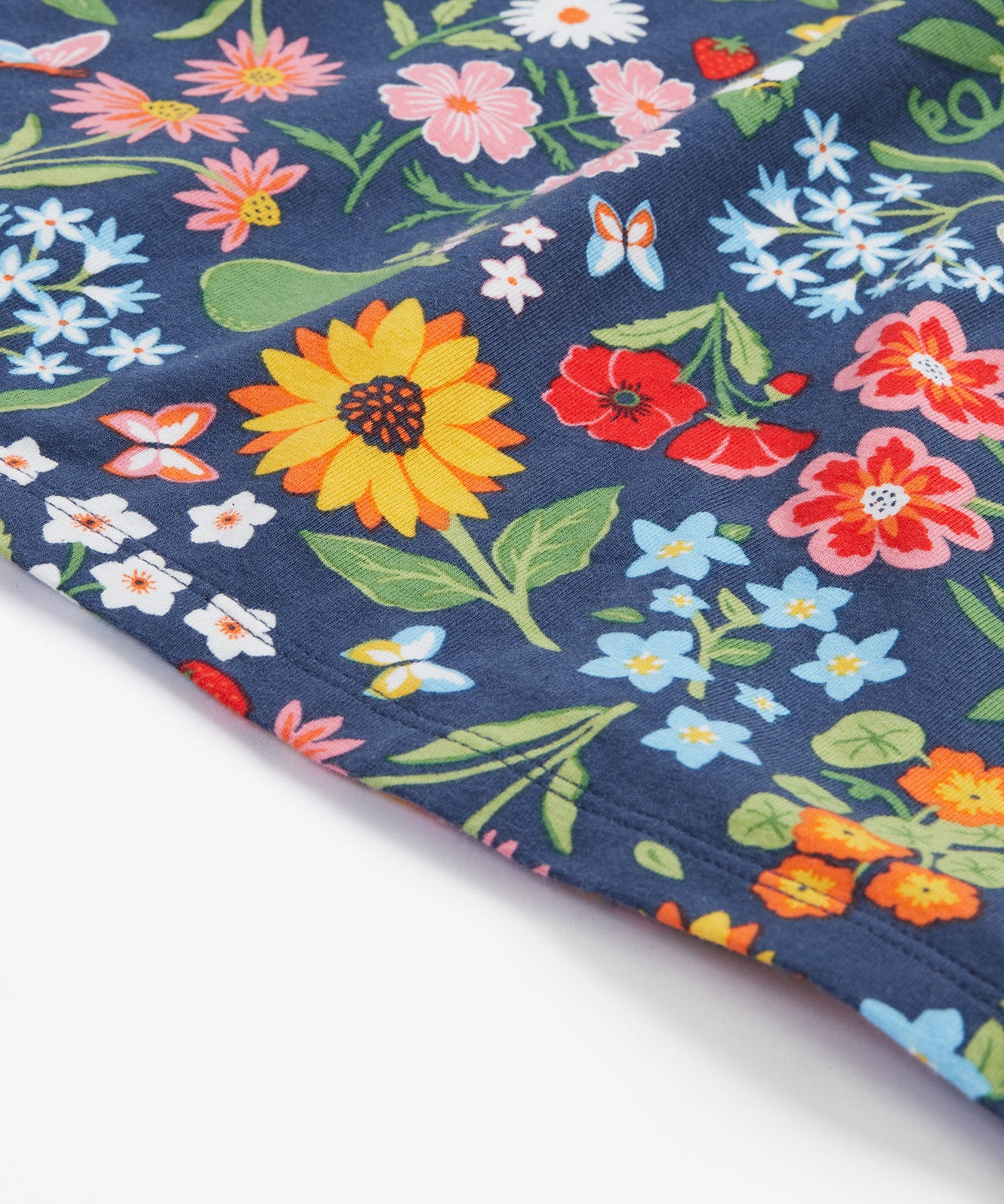 Frugi navy dress potager garden design hem detail