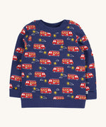 Frugi navy jumper fire engine design on a cream background.