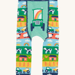 Frugi knitted leggings farm and tractor design on a cream background.