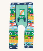 Frugi knitted leggings farm and tractor design on a cream background.